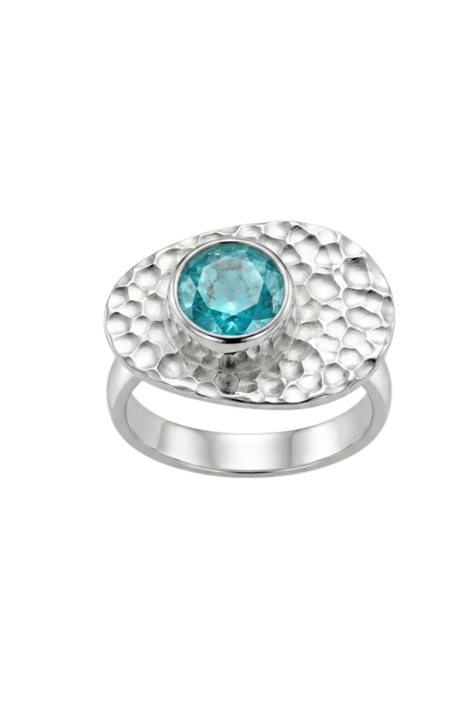 Кольцо Dragon Pale blue — металлическое кольцо с фактурной чеканкой и голубым камнем в оправе.
